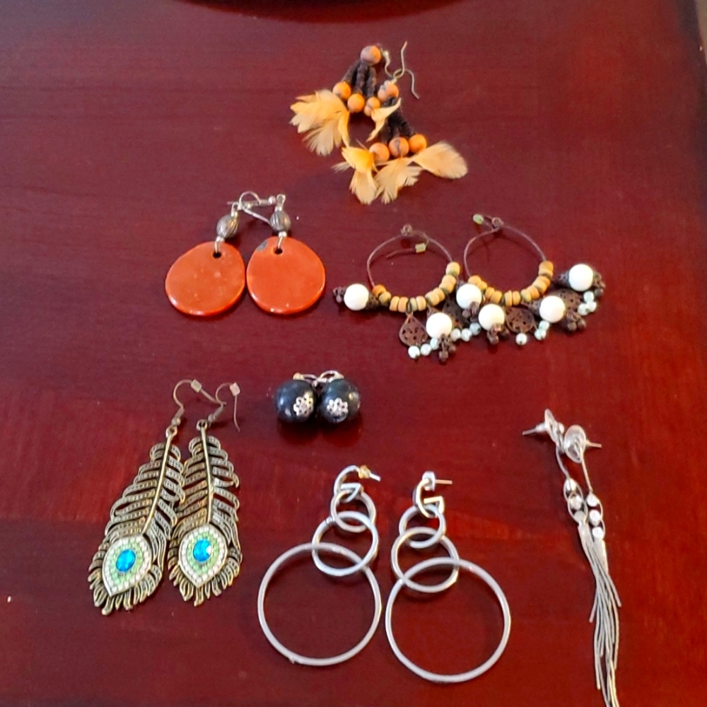 7 pair of earrings.  Hand made.